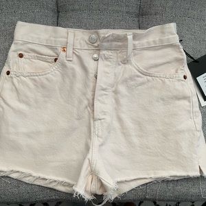 Re/done cream denim distressed shorts